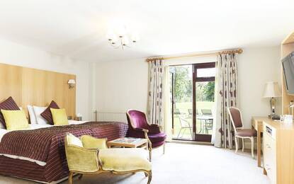 https://dg5r53r4bbz7q.cloudfront.net/media/images/properties/united-kingdom/leicester/champneys-springs/accomodation/premier/springs-bed-12-premier.webp