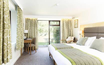 https://dg5r53r4bbz7q.cloudfront.net/media/images/properties/united-kingdom/leicester/champneys-springs/accomodation/standard/springs-bed47-standard.webp